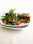 Blattsalat mit Nüssen und Quinoa-Bratlinge