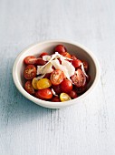 Cherry tomato salad with flaked parmesan