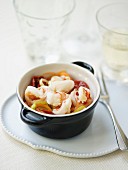 Gambas,confit tomato and thinly sliced pepper casserole in citronella sauce