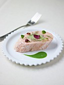 Piece of salmon with creamed dill sauce