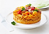 Macaronis and multicolored cherrytomato timbale