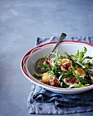 Rocket lettuce,fresh fig and mozzarella-parmesan croquette salad