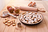 Apple tart with sultanas and pastry hearts
