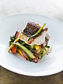 Pan-fried spring vegetables topped with steamed cod