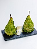 Poached pears coated in pistachios and gorgonzola
