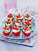 Cherry tomatoes filled with cream cheese and chives