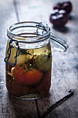 jar of tomates marinated in vanilla-flavored oil