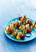 Fruit skewers with toffee and chocolate drippings