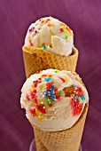 Lemon ice cream cones sprinkles with multicolored drops