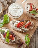 Feta,confit tomatoes and baby shoot open sandwich