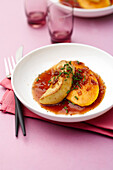 Pan fried sheep cheese with fresh mango and exotic onion sauce