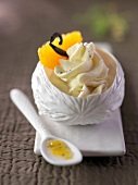 Orange cream dessert with vanilla-flavored whipped cream