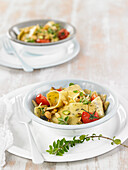 Maltagliatis with herbs and dried fruits