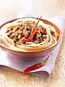 Spaghettis with ground veal,capers and chili peppers