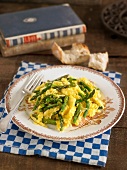Scrambled eggs with green asparagus