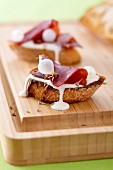 Cancoillotte cheese,grisons meat and garlic Crostinis