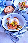 Tunisian tartare with a soft-boiled egg on toast