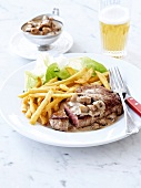 Steak and French fries,button mushroom sauce