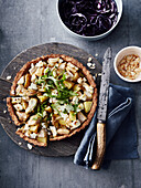 Potato,feta and thinly sliced almond pie with red cabbage salad