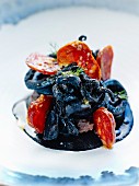 Calamay rings in squid ink with Chorizo