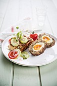 Scotch eggs with baked cheese