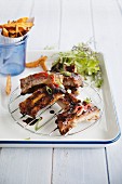 Oriental spare ribs with sweet potato fries