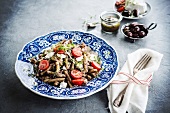 Pasta with tapenade, feta and cherry tomatoes