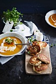 Pumpkin soup, blinis and ricotta