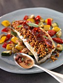 Bass with sliced chorizo and crisp vegetables