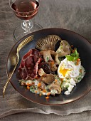 Pan-fried mushrooms,herb cream,coppa crisps and a poached egg