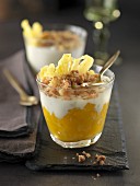 Fromage blanc with stewed pineapple and mango topped with coconut crumble