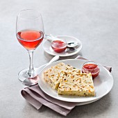 Iced nougat with rhubarb-strawberry jam, glass of Clairet rosé wine