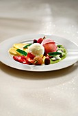 Plate of fresh fruit and scoops of sorbet