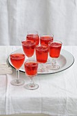 Glasses of raspberry juice