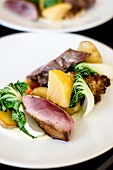 Duck with potatoes, chard and grilled cauliflower