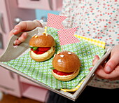 Confectioner's custard and strawberry mini brioche burgers