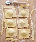 Cutting the stuffed raviolis with a pastry cutter
