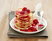 Yoghurt blinis with raspberry coulis