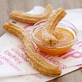Cinnamon Churros and passion fruit coulis