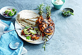 Grilled chipotle chicken with bean salsa and tortillas
