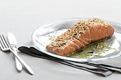 Piece of salmon with green tea