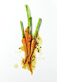 Spring carrots with gravy and black sesame seeds