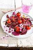 Baby beetroot leaves and cherry tomato salad