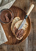 Homemade chocolate-hazelnut spread on sliced bread