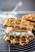 Potato waffles with dill cream,salmon and cucumber