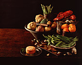 Still life with lobster, fruit, vegetables and cheese