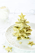 Matcha green tea Christmas stars stuffed with goat's cheese and confit zucchinis