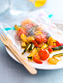 Courgette, cherry tomato, pepper and onion papillote