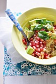Quinoa, avocado, pomegranate and basil salad