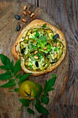 Green tomato, squash seed, roasted soya bean and fresh herb pizza